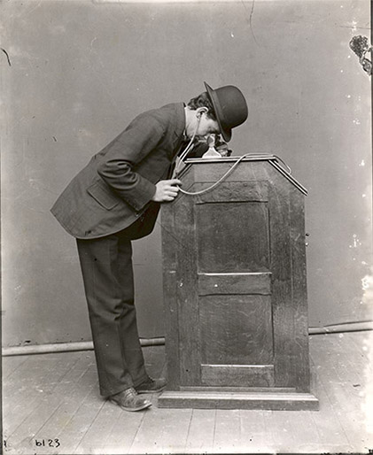 Publicity photograph of man using Edison Kinetophone, ca. 1895 Publicity photograph of man using Edison Kinetophone, 1895